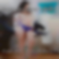 Naked housewife making